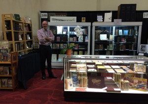 Vic Zoschak of Tavistock Books, in Booth 100. (Which is really stupendously set up and decorated, which you are all welcome to comment on...)